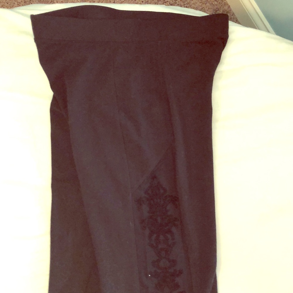 Black leggings with lace design on outside of legs